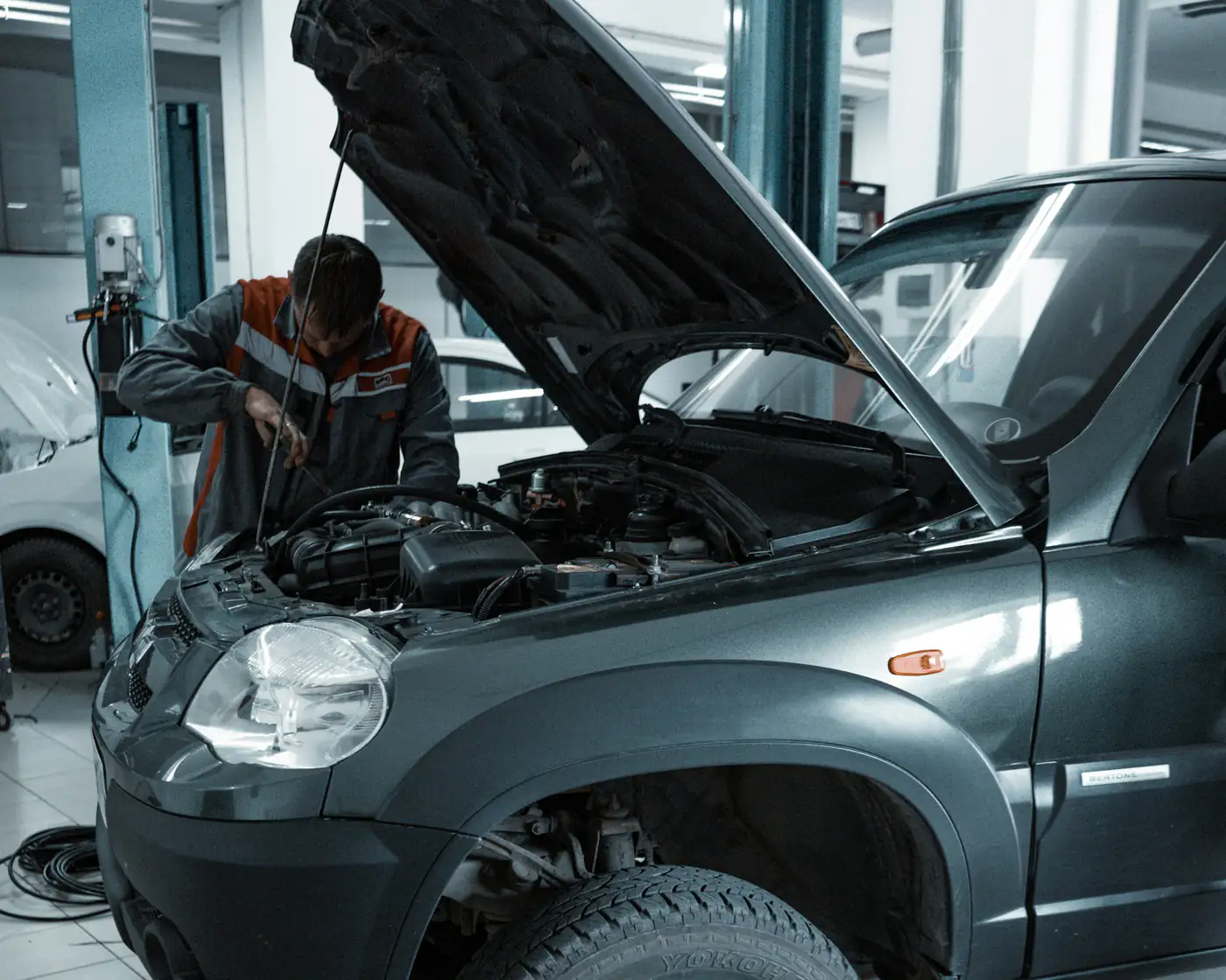 Technician at work inside the  Dubai Car Battery Service workshop