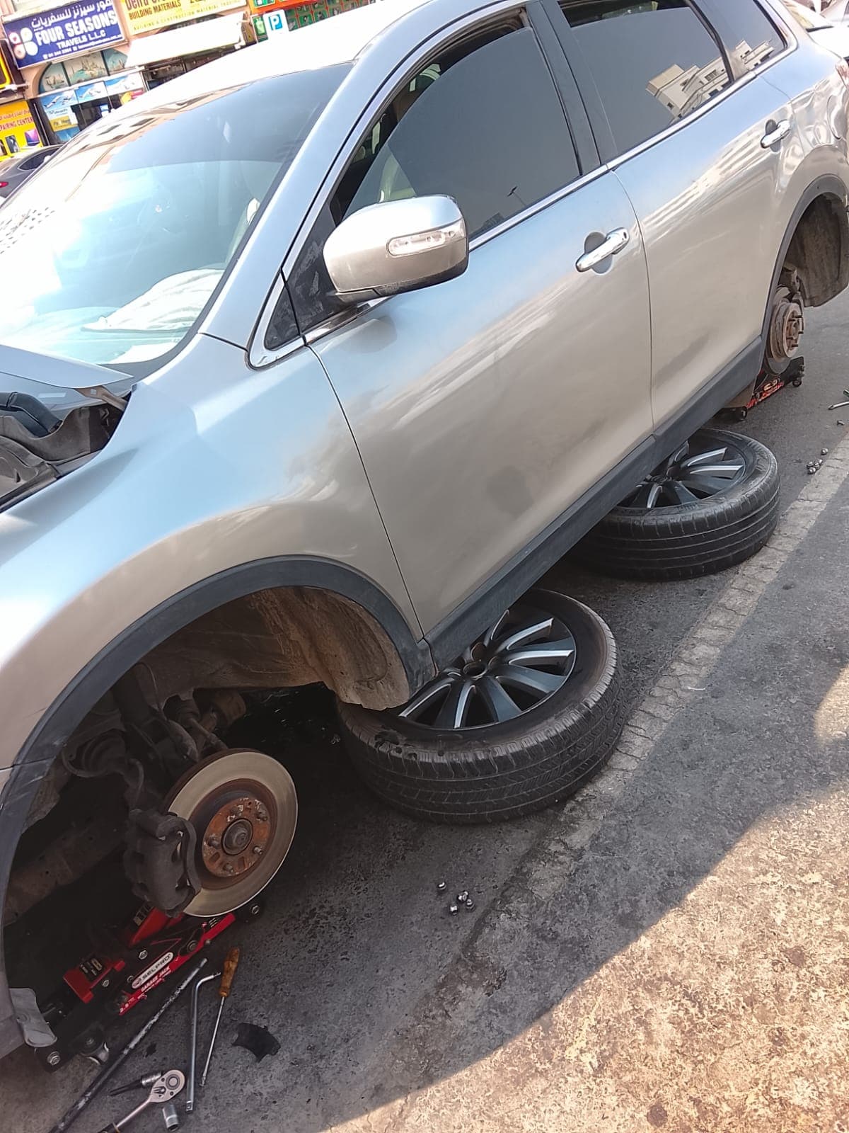 Wheel and tyre change at the roadside in Dubai