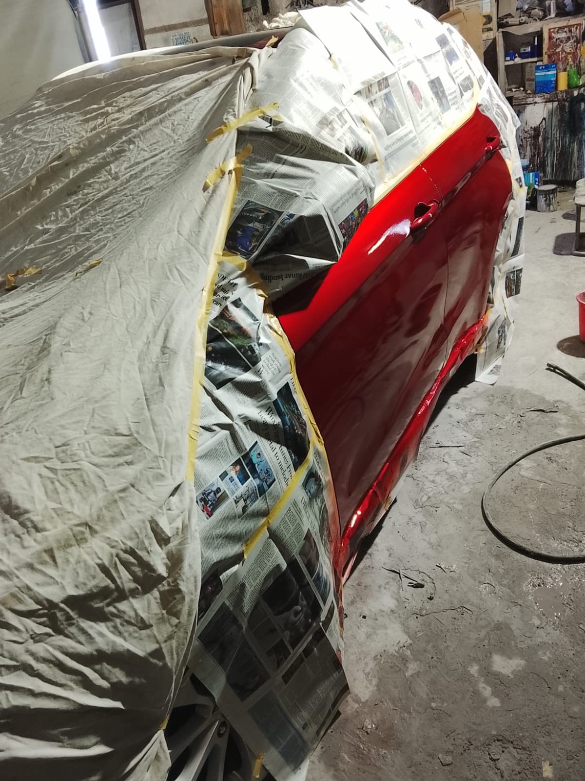 Car body masked and prepped for a respray in the workshop