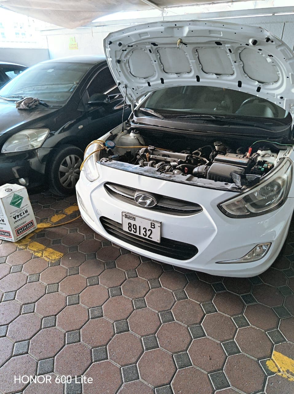 AC gas recharge service on a Hyundai Accent